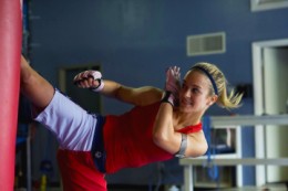 martial arts kick to heavy bag